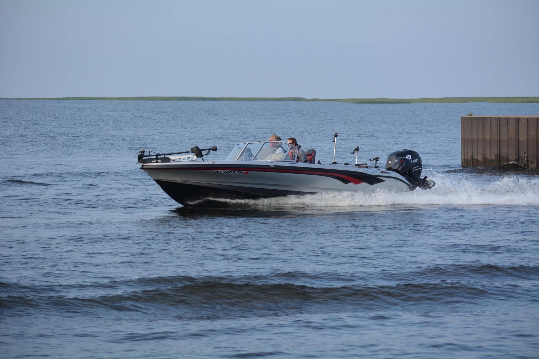 Wayne Butz Ranger boat running across the water