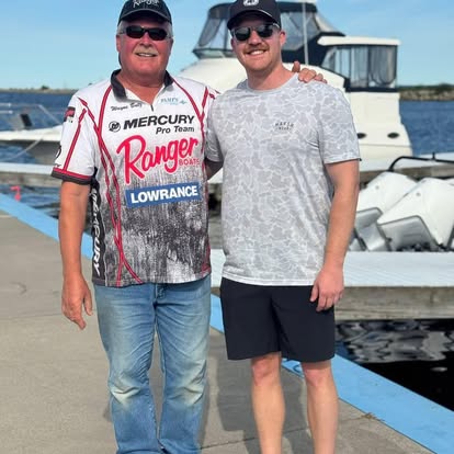 Wayne Butz at the marina with another angler